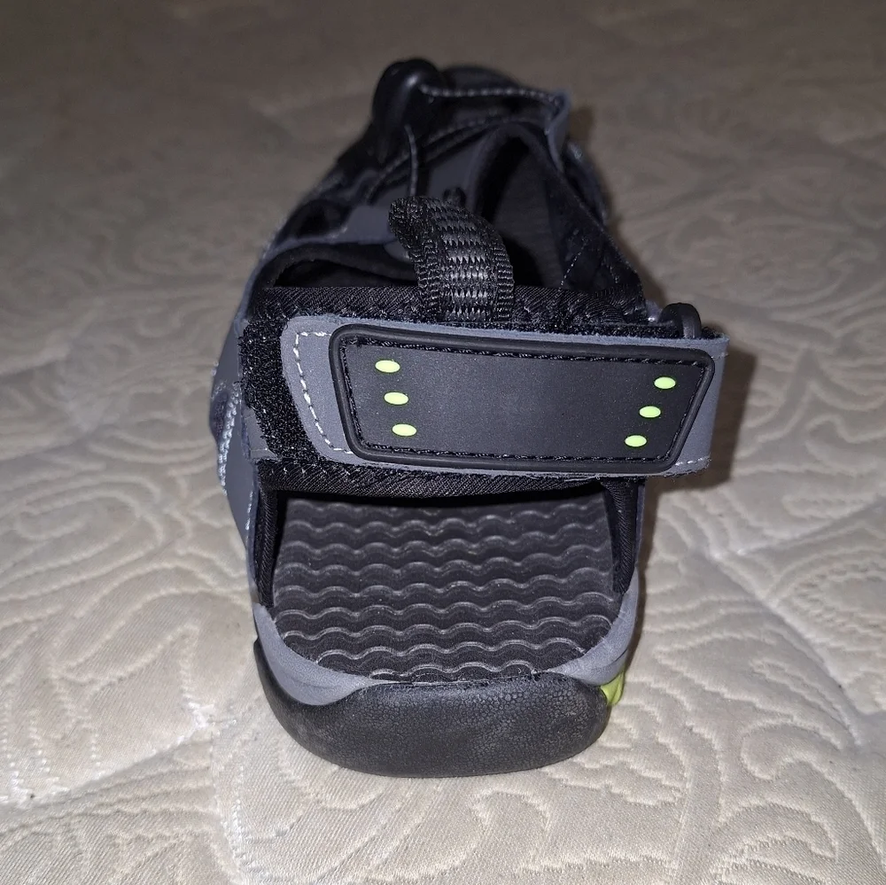 A pair of Coleman George sandals in a men's size 13M. They're in excellent shape